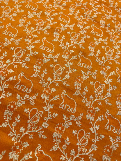 Premium orange Silk Brocade Banarasi Fabric with Elephant & Floral Motifs 44inch width